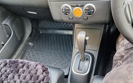 Nissan Tiida, 2005 год, 670 000 рублей, 9 фотография