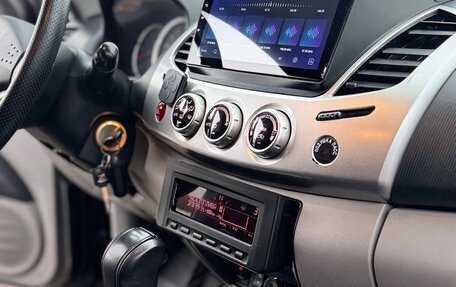 Mitsubishi L200 IV рестайлинг, 2013 год, 1 850 000 рублей, 25 фотография