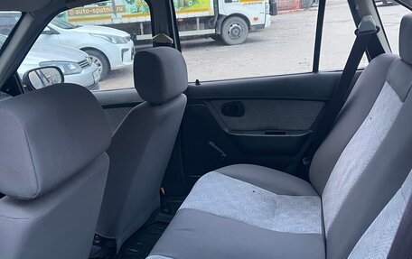 Daewoo Nexia I рестайлинг, 2011 год, 23 фотография