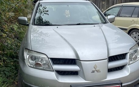 Mitsubishi Outlander III рестайлинг 3, 2007 год, 700 000 рублей, 8 фотография
