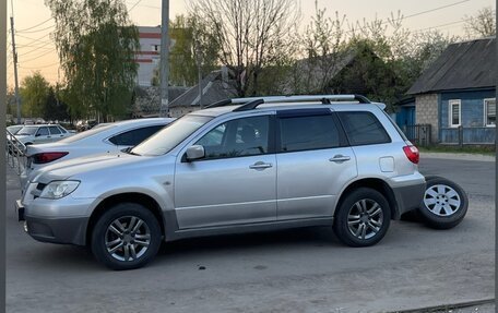 Mitsubishi Outlander III рестайлинг 3, 2007 год, 700 000 рублей, 12 фотография