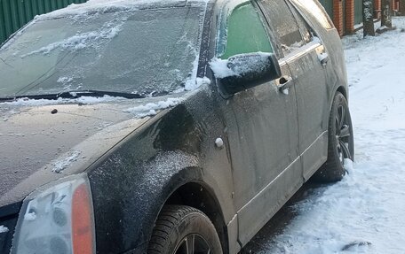 Cadillac SRX II рестайлинг, 2007 год, 700 000 рублей, 3 фотография