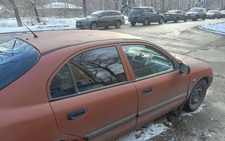 Mitsubishi Carisma I, 1999 год, 125 000 рублей, 6 фотография