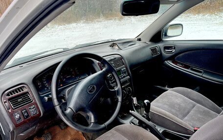 Toyota Avensis III рестайлинг, 2002 год, 170 000 рублей, 19 фотография