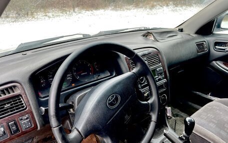 Toyota Avensis III рестайлинг, 2002 год, 170 000 рублей, 20 фотография