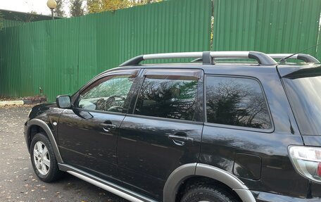 Mitsubishi Outlander III рестайлинг 3, 2005 год, 670 000 рублей, 4 фотография