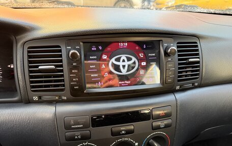 Toyota Corolla, 2004 год, 550 000 рублей, 10 фотография