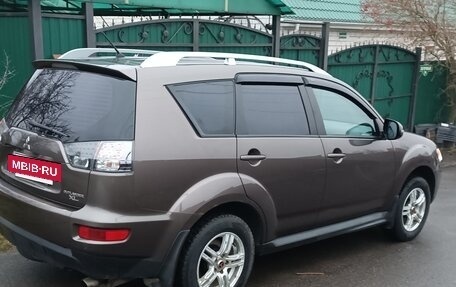 Mitsubishi Outlander III рестайлинг 3, 2009 год, 970 000 рублей, 2 фотография