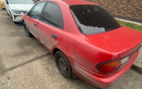 Mazda 323, 1998 год, 150 000 рублей, 3 фотография