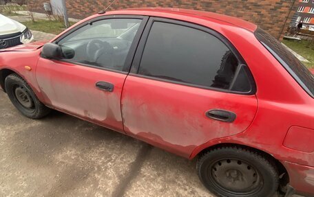 Mazda 323, 1998 год, 150 000 рублей, 2 фотография