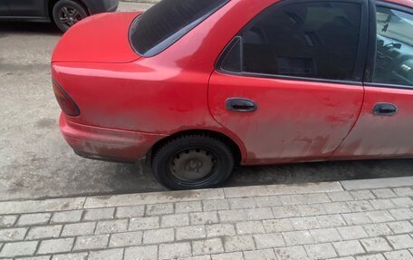 Mazda 323, 1998 год, 150 000 рублей, 5 фотография