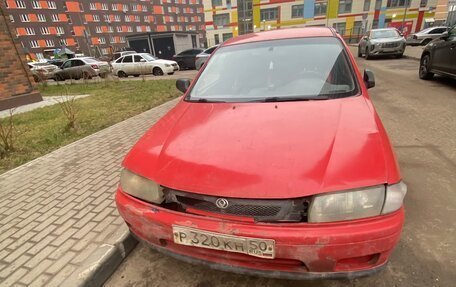 Mazda 323, 1998 год, 150 000 рублей, 8 фотография
