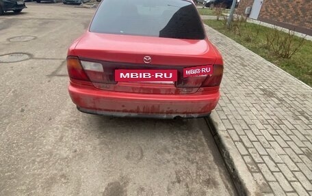 Mazda 323, 1998 год, 150 000 рублей, 4 фотография