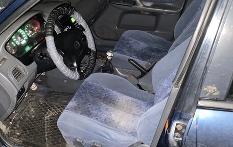 Mazda 323, 1999 год, 155 000 рублей, 7 фотография