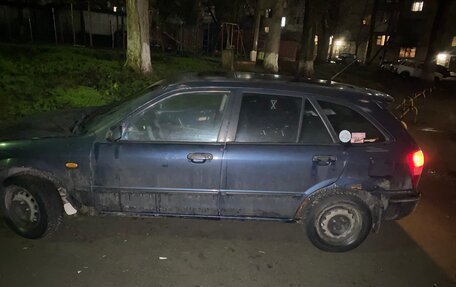 Mazda 323, 1999 год, 155 000 рублей, 12 фотография