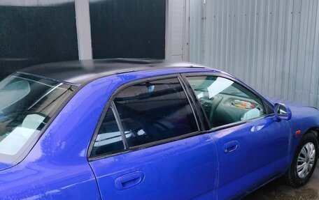 Mitsubishi Carisma I, 1996 год, 310 000 рублей, 5 фотография