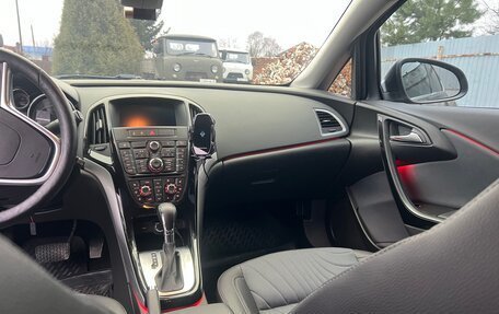 Opel Astra J, 2014 год, 21 фотография