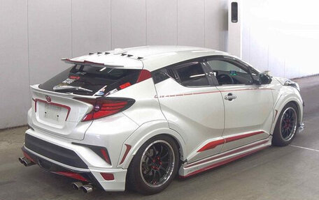 Toyota C-HR I рестайлинг, 2019 год, 3 250 000 рублей, 21 фотография