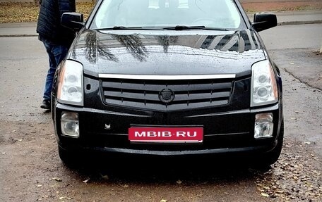 Cadillac SRX II рестайлинг, 2007 год, 450 000 рублей, 1 фотография