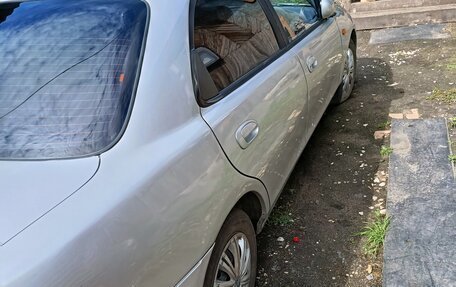 Ford Laser IV, 1994 год, 140 000 рублей, 8 фотография
