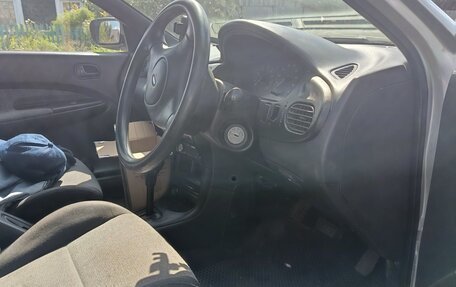 Ford Laser IV, 1994 год, 140 000 рублей, 11 фотография