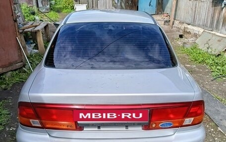 Ford Laser IV, 1994 год, 140 000 рублей, 7 фотография