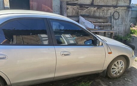 Ford Laser IV, 1994 год, 140 000 рублей, 24 фотография