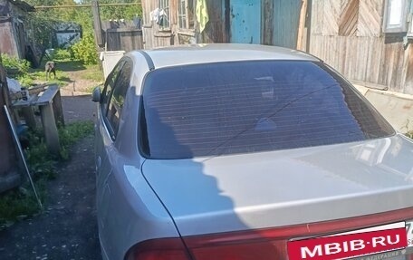 Ford Laser IV, 1994 год, 140 000 рублей, 23 фотография