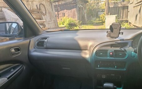 Ford Laser IV, 1994 год, 140 000 рублей, 37 фотография