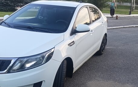 KIA Rio III рестайлинг, 2012 год, 825 000 рублей, 18 фотография