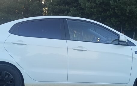 KIA Rio III рестайлинг, 2012 год, 825 000 рублей, 21 фотография