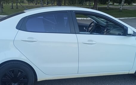 KIA Rio III рестайлинг, 2012 год, 825 000 рублей, 37 фотография