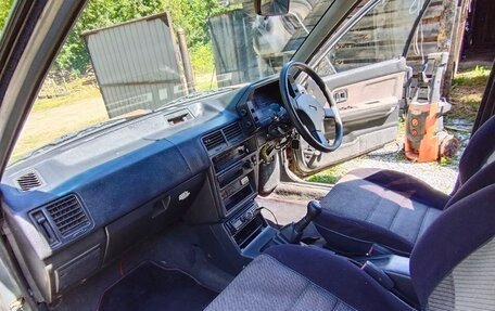 Mazda Familia, 1989 год, 160 000 рублей, 24 фотография