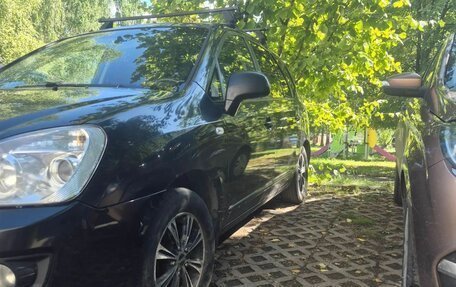 KIA Carens III (RP), 2011 год, 645 000 рублей, 2 фотография