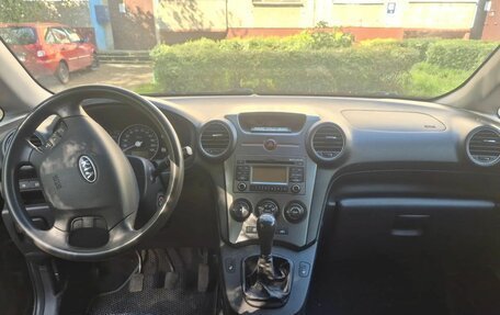 KIA Carens III (RP), 2011 год, 645 000 рублей, 4 фотография