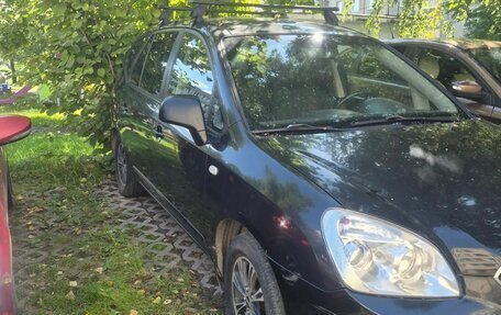KIA Carens III (RP), 2011 год, 645 000 рублей, 10 фотография
