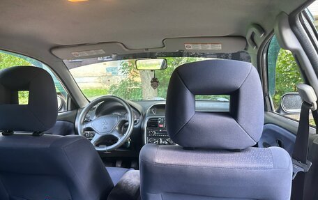 Mitsubishi Carisma I, 2003 год, 250 000 рублей, 10 фотография