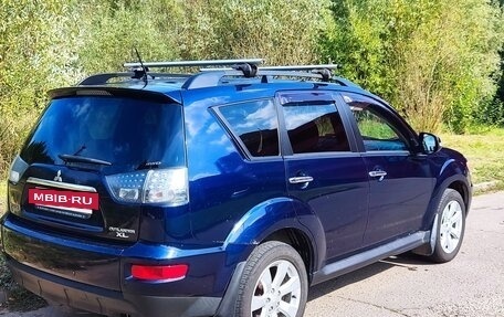 Mitsubishi Outlander III рестайлинг 3, 2011 год, 920 000 рублей, 4 фотография