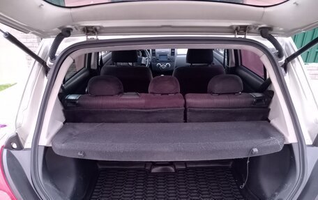 Nissan Tiida, 2010 год, 700 000 рублей, 9 фотография
