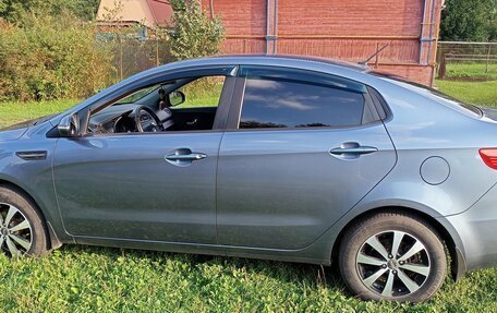 KIA Rio III рестайлинг, 2012 год, 750 000 рублей, 4 фотография
