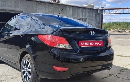 Hyundai Solaris II рестайлинг, 2011 год, 670 000 рублей, 4 фотография