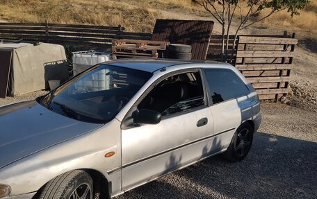 Mazda 323, 1998 год, 190 000 рублей, 11 фотография