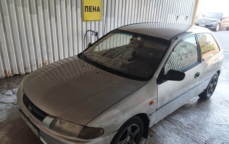 Mazda 323, 1998 год, 190 000 рублей, 13 фотография