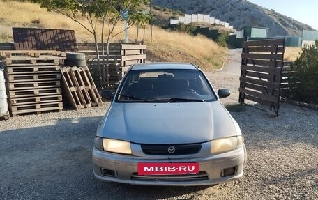 Mazda 323, 1998 год, 190 000 рублей, 9 фотография