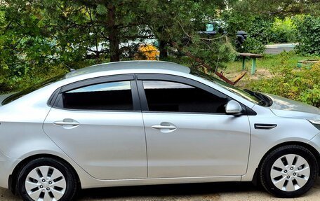 KIA Rio III рестайлинг, 2012 год, 650 000 рублей, 19 фотография