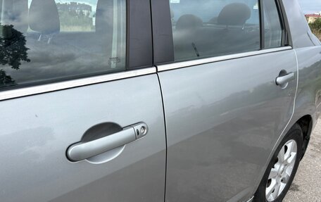 Nissan Tiida, 2010 год, 855 000 рублей, 14 фотография