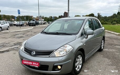 Nissan Tiida, 2010 год, 855 000 рублей, 5 фотография