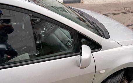 Nissan Tiida, 2011 год, 850 000 рублей, 23 фотография