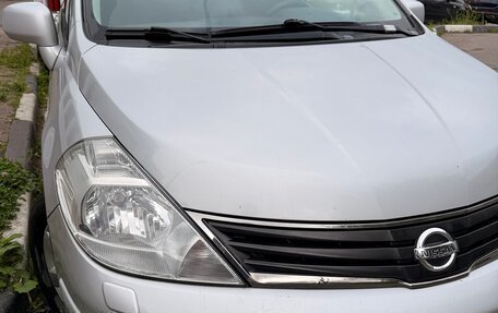 Nissan Tiida, 2011 год, 850 000 рублей, 21 фотография