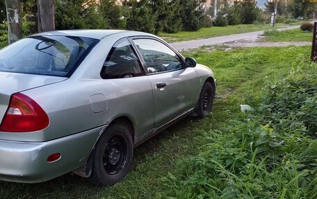 Mitsubishi Mirage VI рестайлинг, 2001 год, 120 000 рублей, 5 фотография